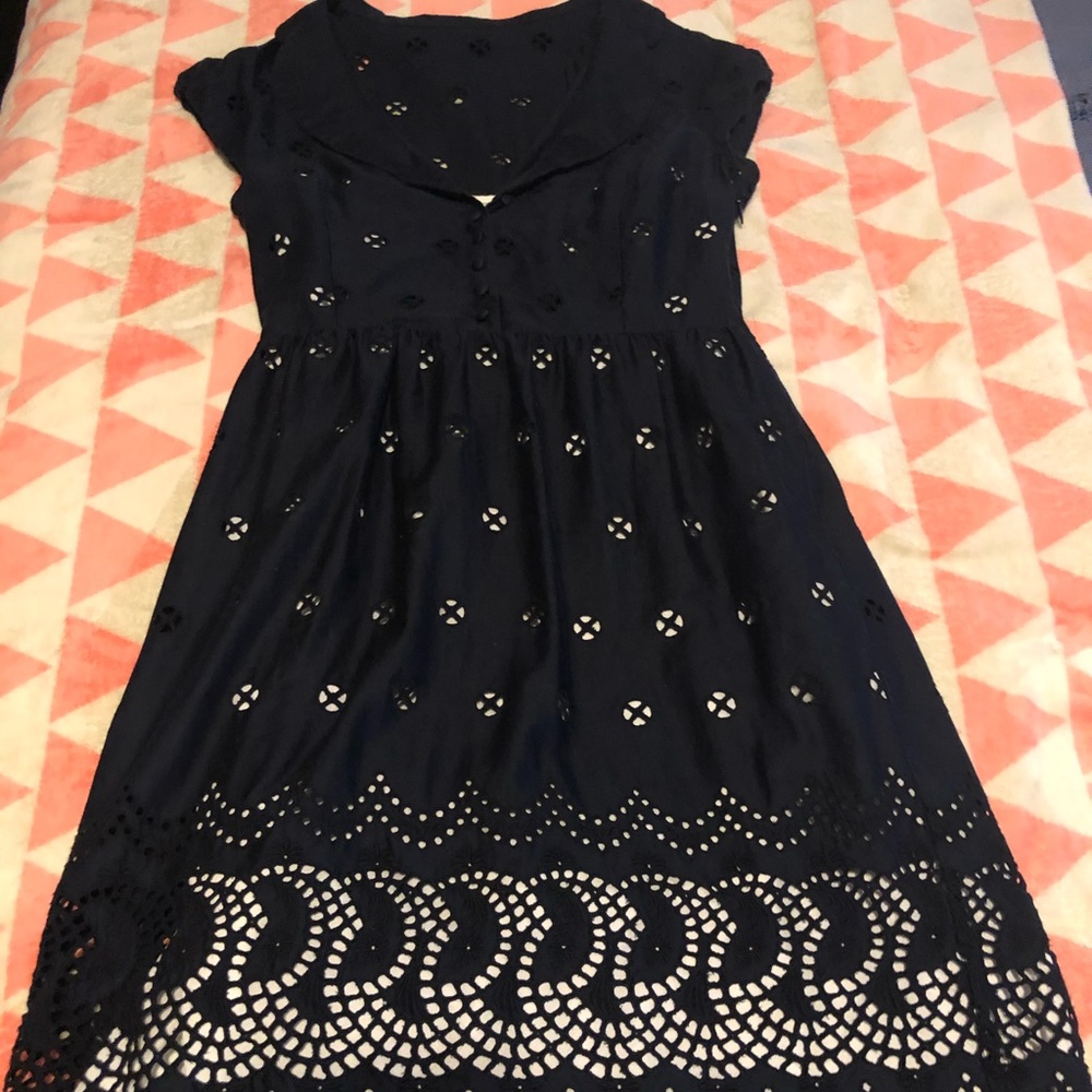 Black dress w/ keyhole cutouts and scalloped hem